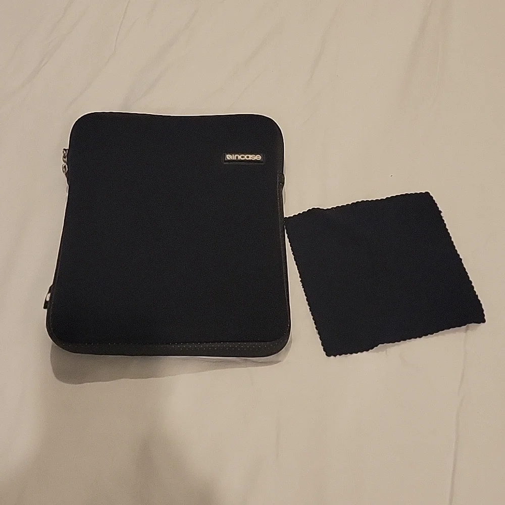 Padded tablet case with cleaning cloth
